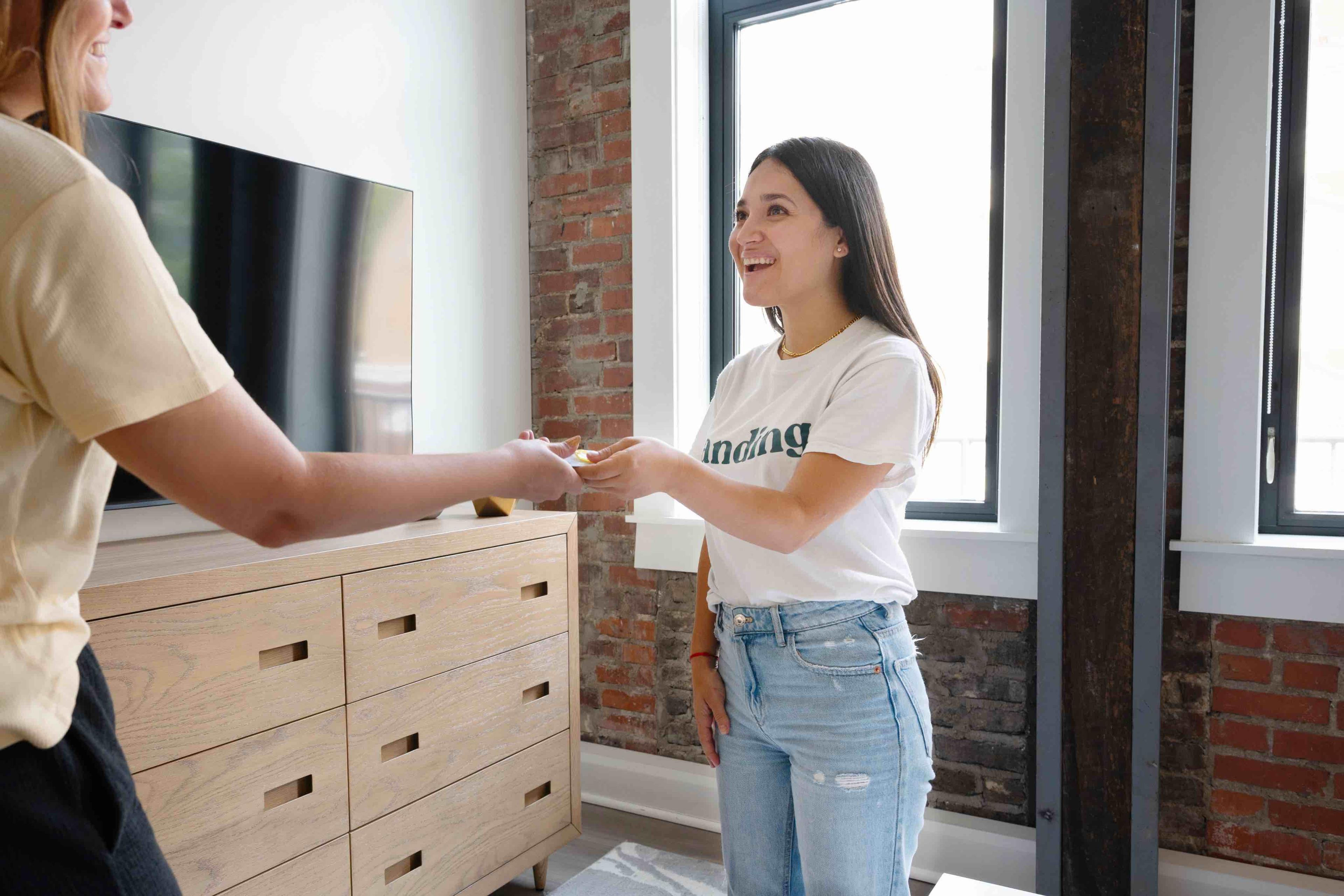 woman talking with Landing shirt