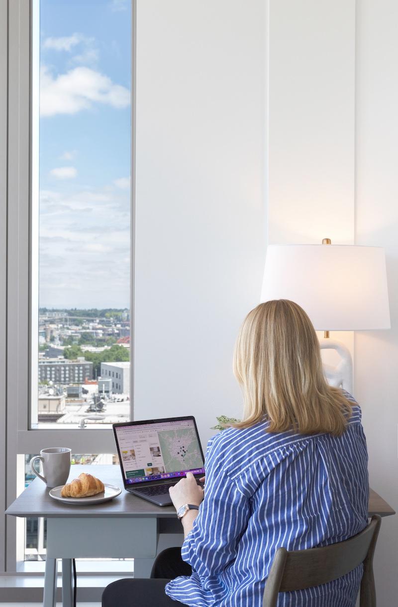 woman browsing Landing for homes